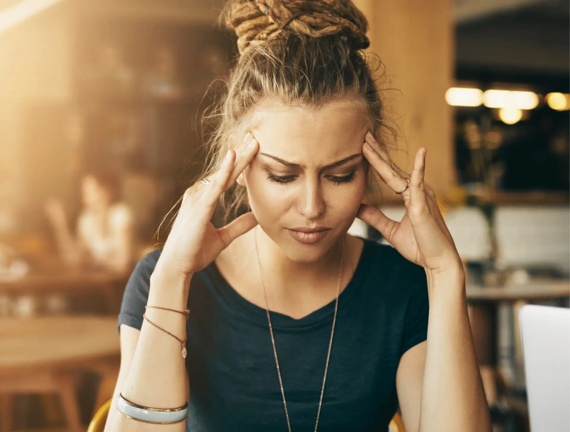 woman with migraine headache